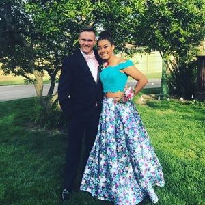 2-piece prom dress. Size 8; smoke &pet free home